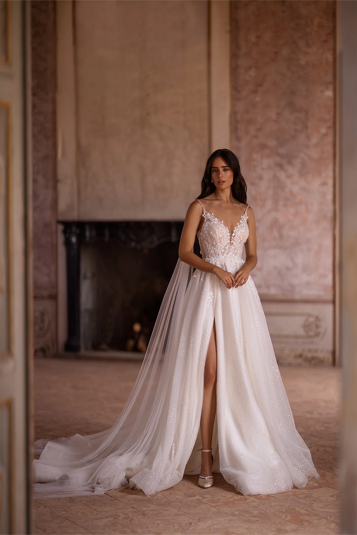 Ivory A-Line Spaghetti Strap Wedding Dress with V-Neck – Sleeveless Lace Wedding Dress with Thigh Slit and Flowing Sheer Train Plus Size