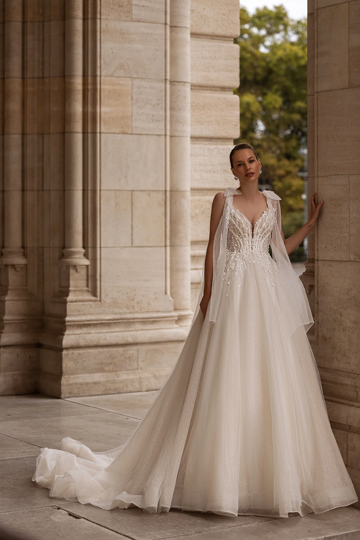 Sleeveless Wedding Dress with Shoulder Bows – V-Neck Bridal Gown with Floral Lace Bodice and Layered Chiffon Skirt Plus Size