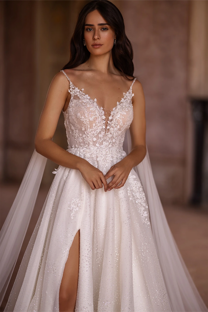 Ivory A-Line Spaghetti Strap Wedding Dress with V-Neck – Sleeveless Lace Wedding Dress with Thigh Slit and Flowing Sheer Train Plus Size