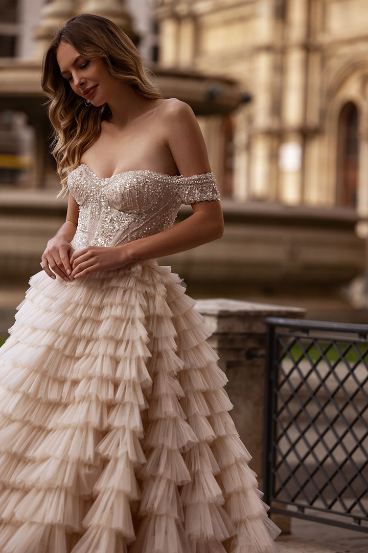 Off Shoulder Wedding Dress with Ruffled Tiered Skirt – Layered Tulle Ruffle Dress with Pearl Trim and Crisscross Back Plus Size