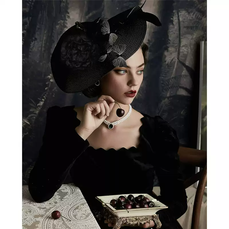 Elegant Black Fascinator Hat with Floral Embellishment