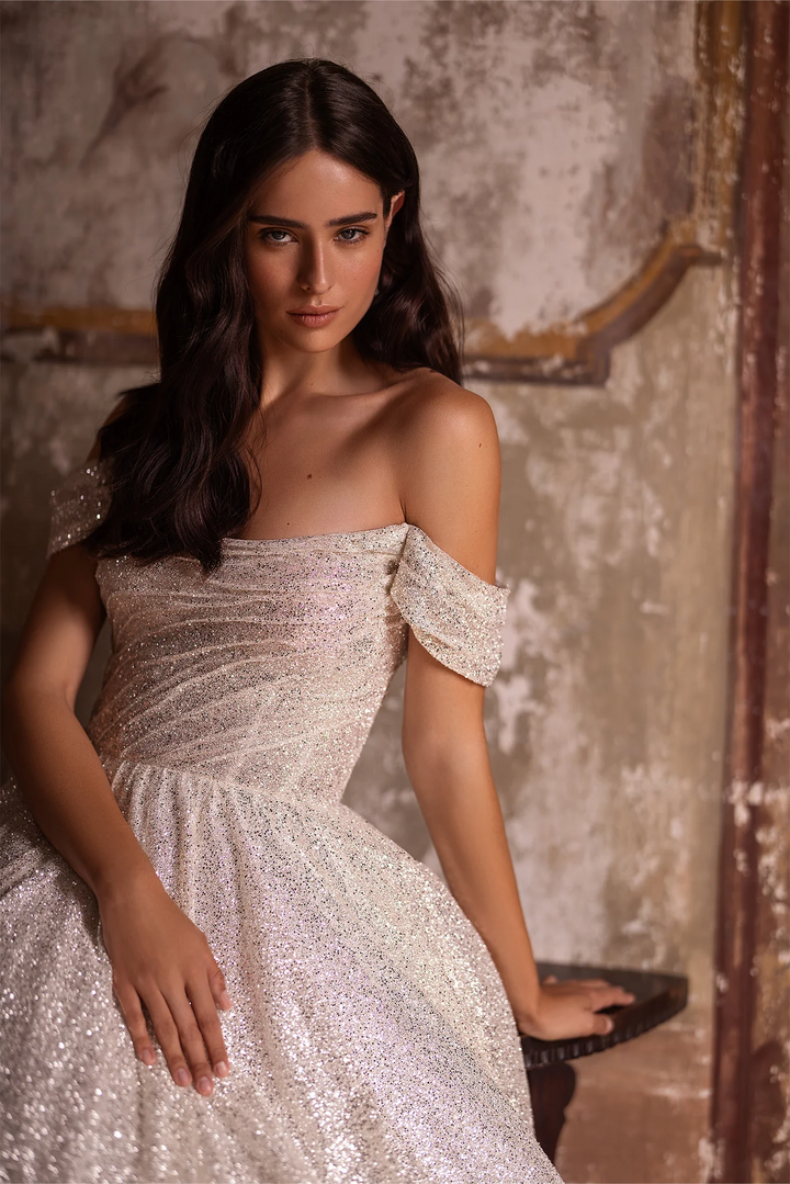 Ivory Off-the-Shoulder Wedding Dress with Low-Cut Neckline – Sequin Ball Gown Wedding Dress with Flowing Train Plus Size