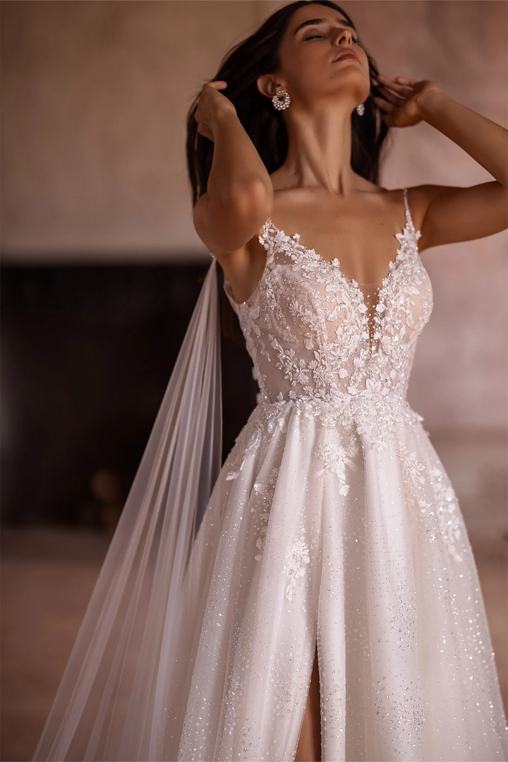 Ivory A-Line Spaghetti Strap Wedding Dress with V-Neck – Sleeveless Lace Wedding Dress with Thigh Slit and Flowing Sheer Train Plus Size