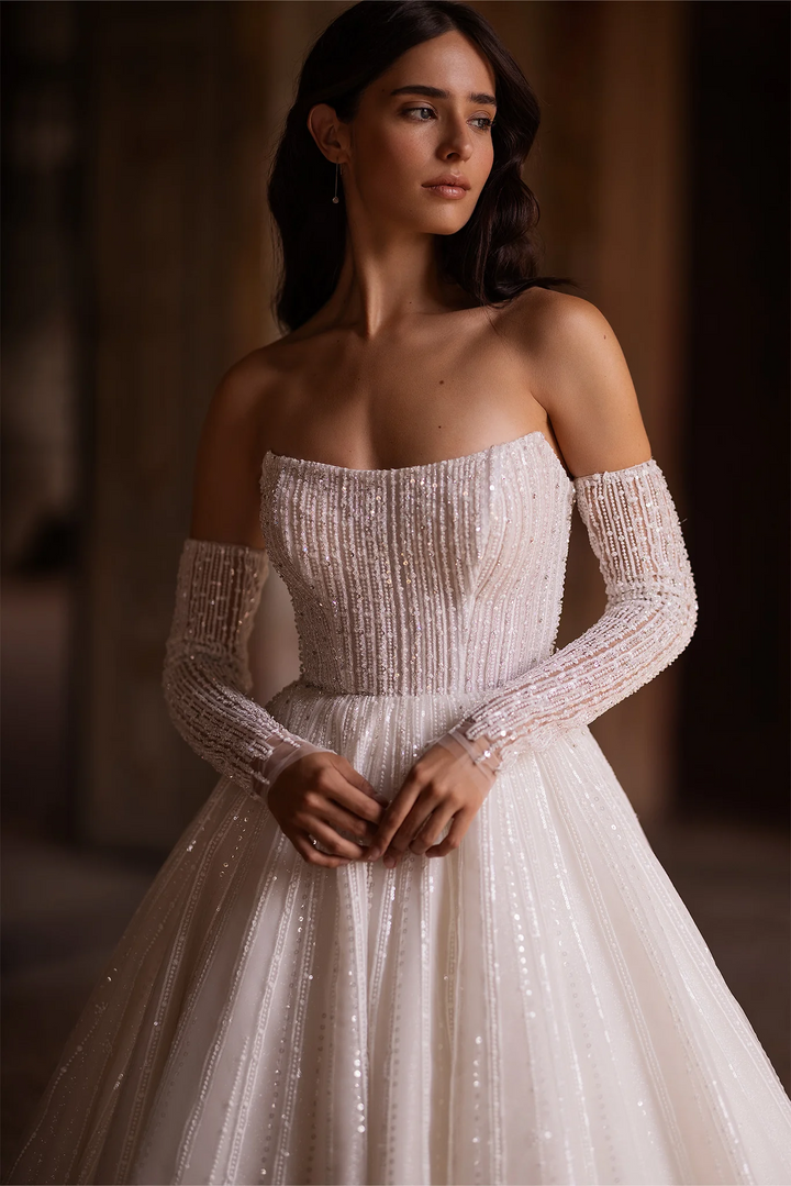 Ivory Sparkly Ball Gown Wedding Dress with Convertible Sleeves – Strapless Wedding Gown with Pearly Adornments and Glittering Sleeves Plus Size