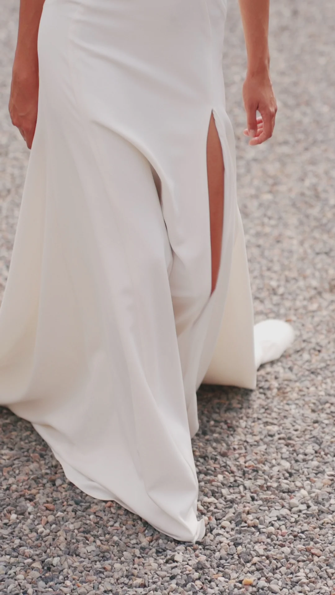 Ivory Off-the-Shoulder Wedding Dress with Thigh Slit – Trumpet Gown with Flower Adorned Neckline and Cascading Bow Plus Size