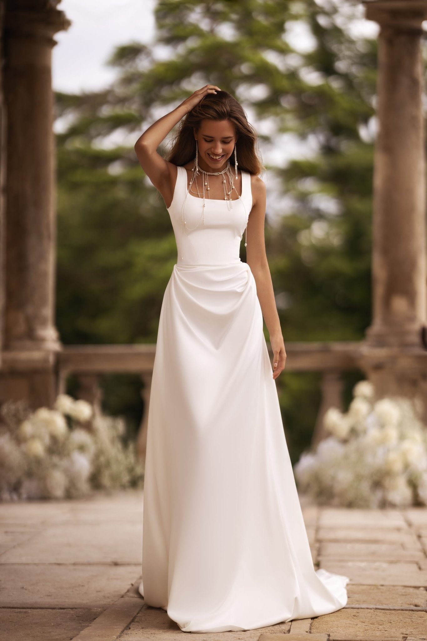Elegant Ivory Satin Wedding Dress with Square Neck Accentuated