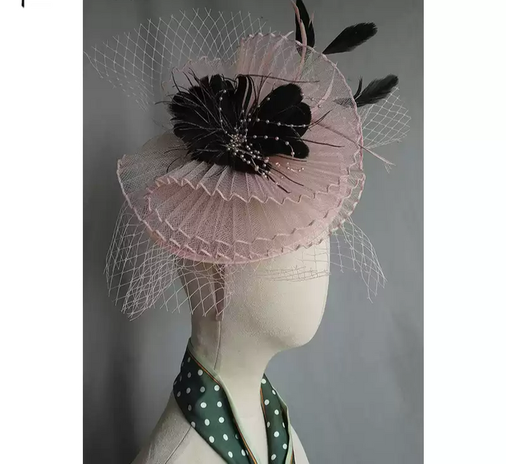 Elegant Pink Fascinator with Feather and Bead Accents