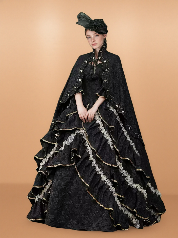 Gothic Black Victorian Ball Gown with Ruffle Cape – Vintage Court Dress with Lace Trim and Statement Hat