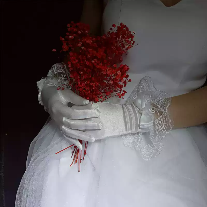 Vintage-Inspired Satin Bridal Gloves with Lace Detailing and Ribbon Accents