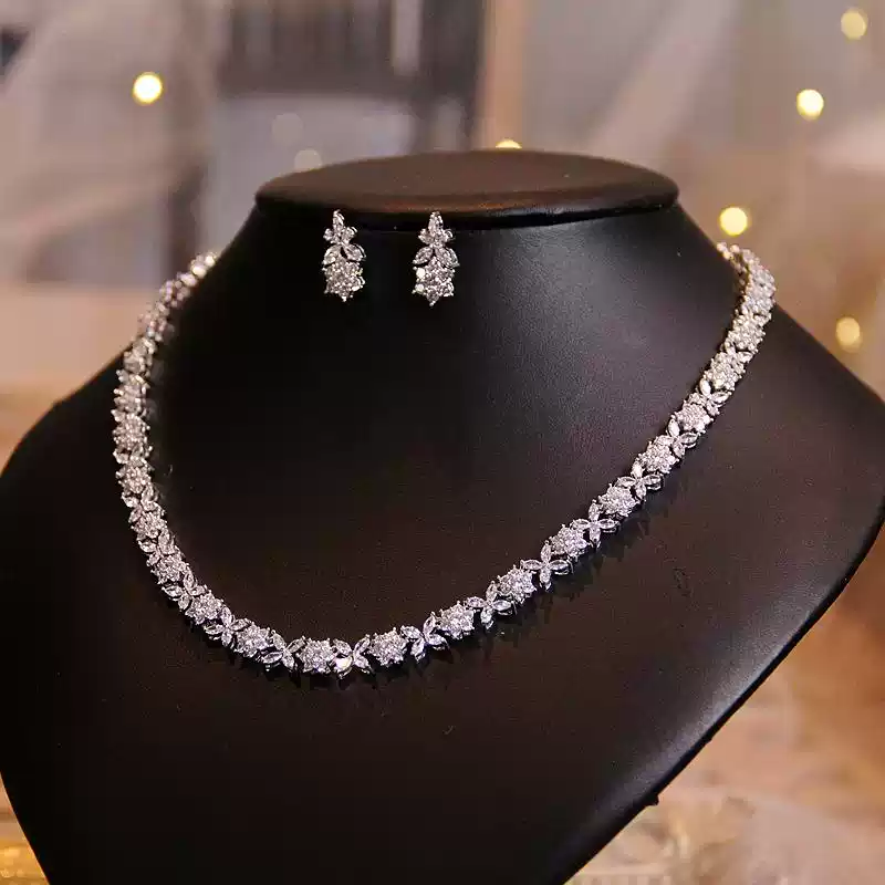 Petal Lattice – Floral Crystal Necklace & Earrings Set