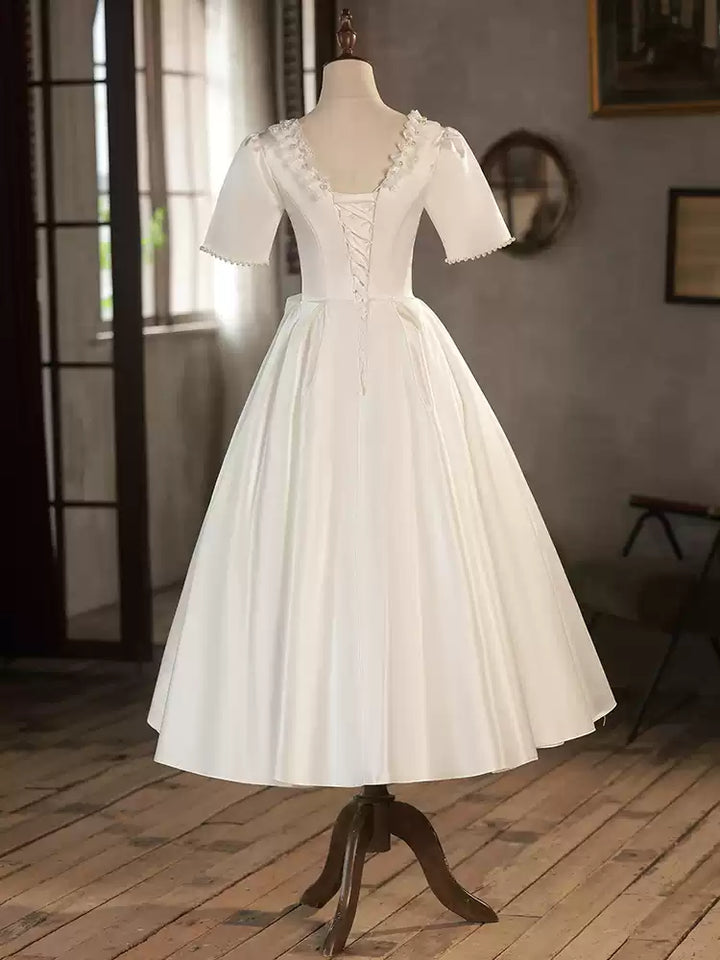 Satin Tea Length Wedding Dress with Floral Neckline – Simple Short Sleeve Wedding Dress with Bow Detail Plus Size