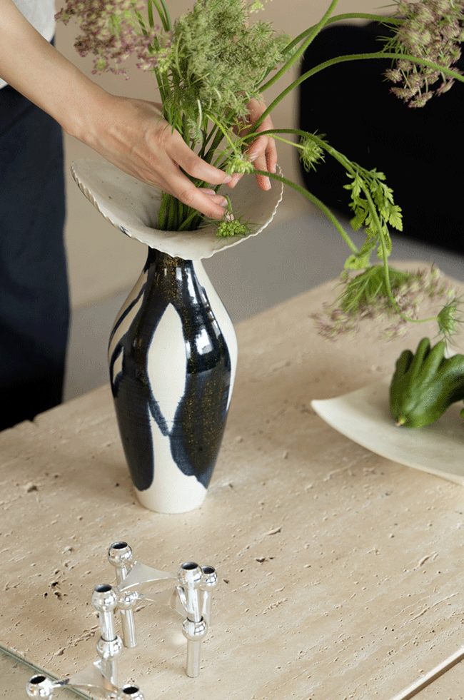 Artistic LA Imported Handcrafted Black and Gold Ceramic Vase with Flowing Glaze Design