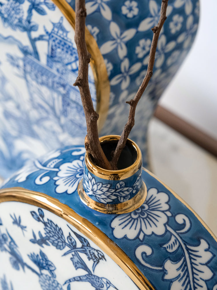 French Imported Oriental Hand-Painted Blue and White Porcelain Vases with Gilded Accents
