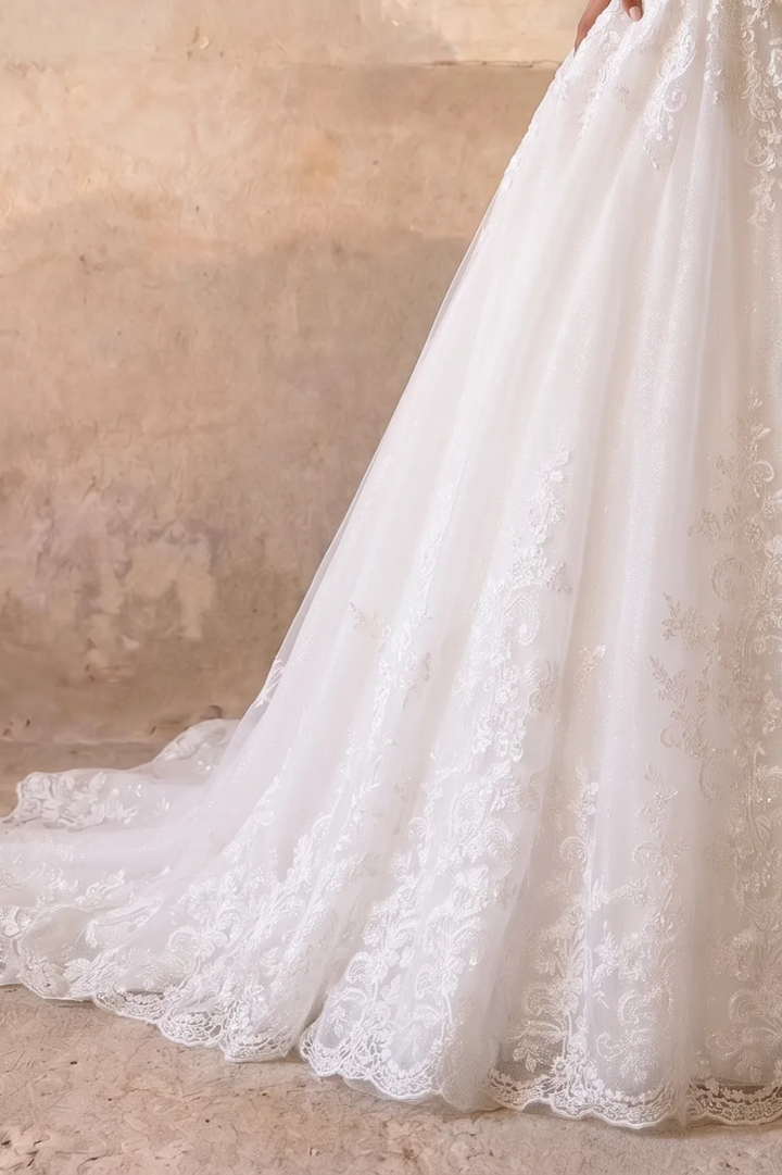 Enchanting Sparkle: Modest Ball Gown Lace Long Sleeve Wedding Dress Plus Size