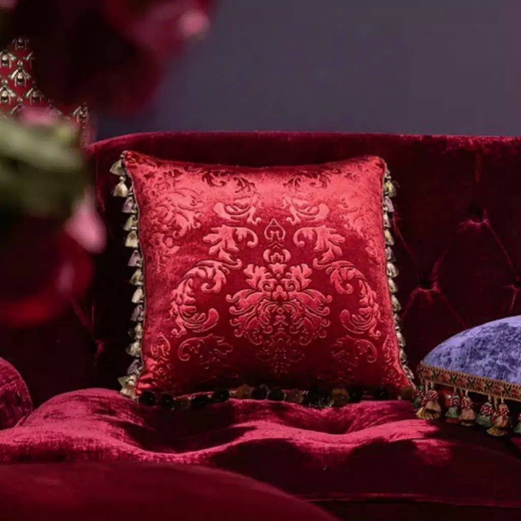 Midnight Regal – Handmade Purple Velvet Cushion with Embossed Baroque Pattern and Pom Trim