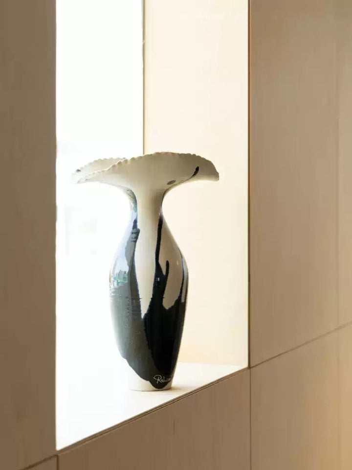 Artistic LA Imported Handcrafted Black and Gold Ceramic Vase with Flowing Glaze Design