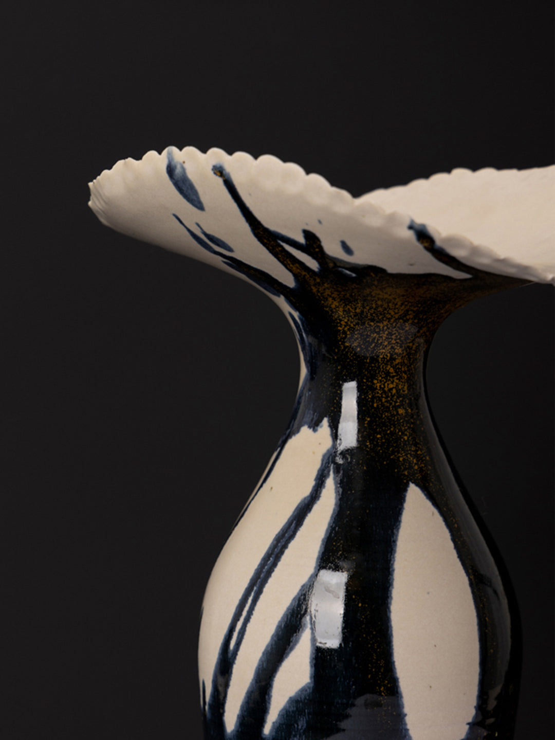 Artistic LA Imported Handcrafted Black and Gold Ceramic Vase with Flowing Glaze Design