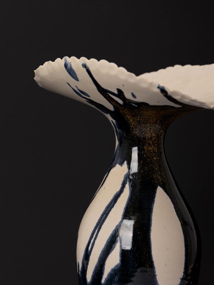 Artistic LA Imported Handcrafted Black and Gold Ceramic Vase with Flowing Glaze Design