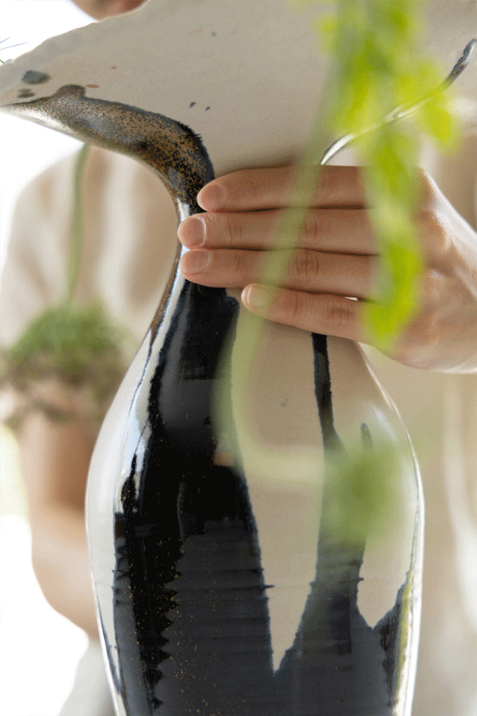 Artistic LA Imported Handcrafted Black and Gold Ceramic Vase with Flowing Glaze Design