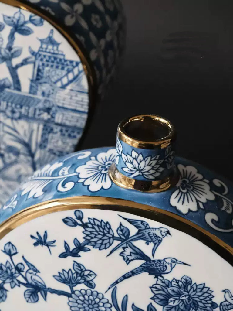 French Imported Oriental Hand-Painted Blue and White Porcelain Vases with Gilded Accents