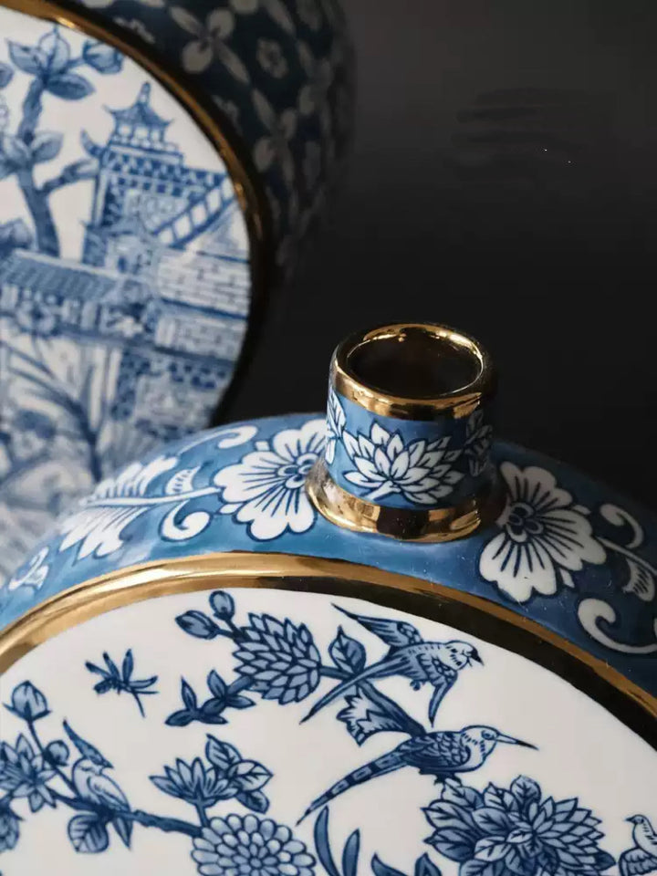 French Imported Oriental Hand-Painted Blue and White Porcelain Vases with Gilded Accents