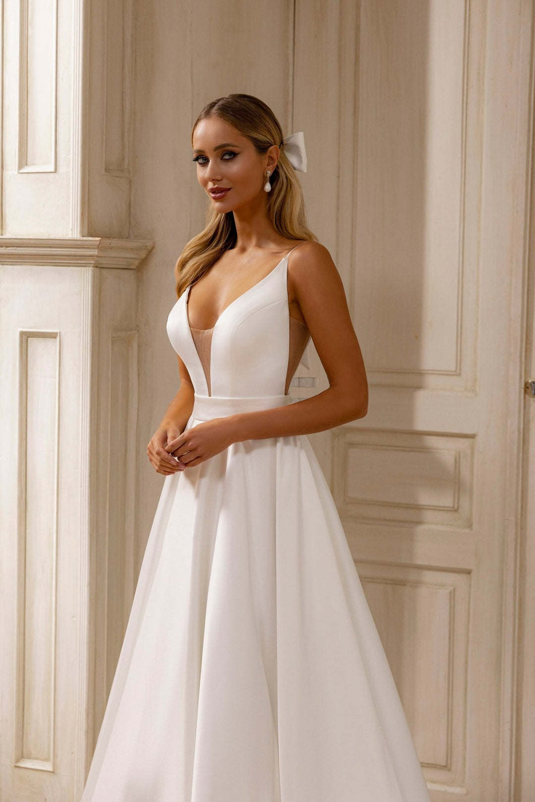 Chic A-Line Wedding Dress with Plunge Neckline and Flowing Train - WonderlandByLilian