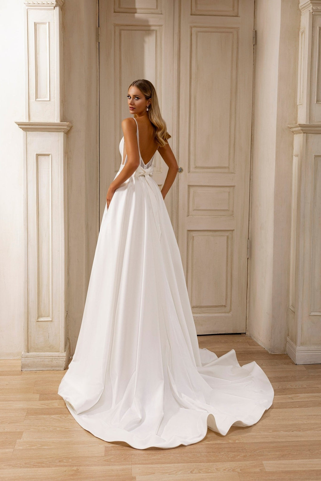 Chic A-Line Wedding Dress with Plunge Neckline and Flowing Train - WonderlandByLilian