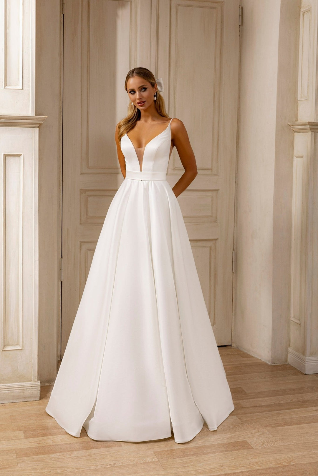 Chic A-Line Wedding Dress with Plunge Neckline and Flowing Train - WonderlandByLilian