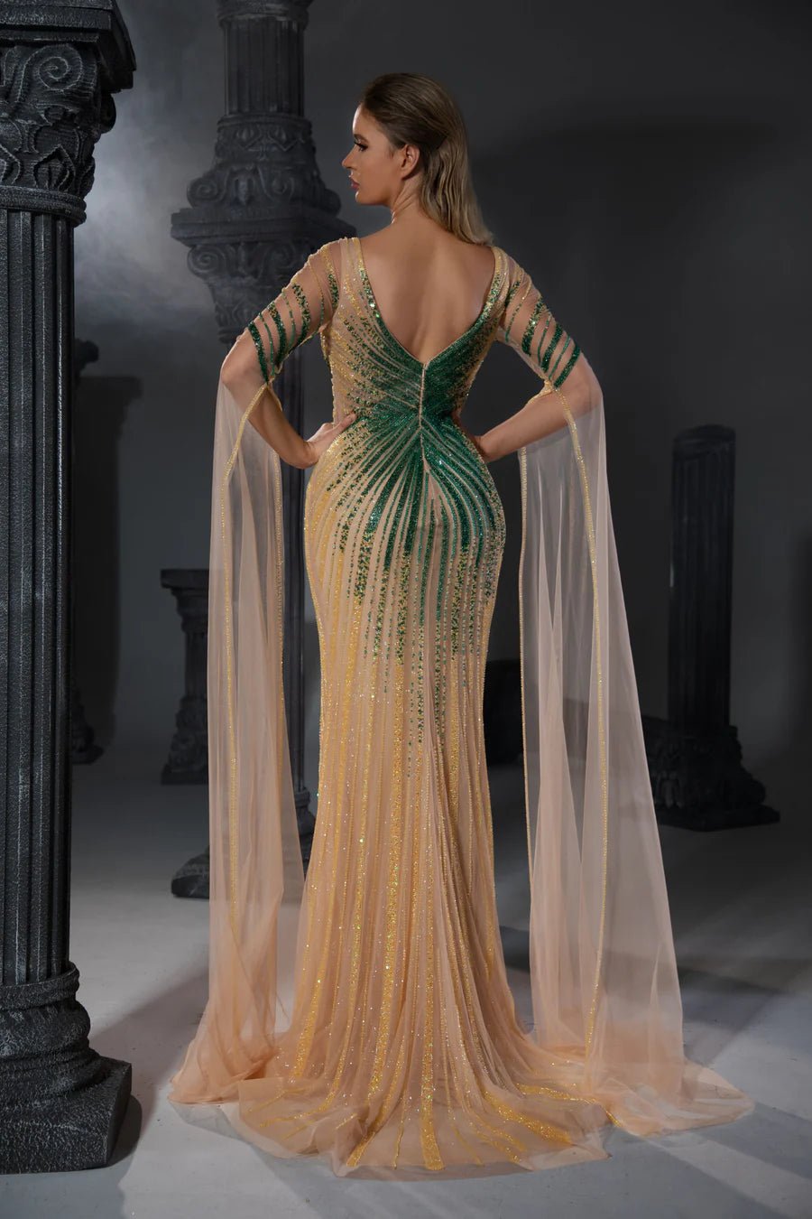 Elegant Champagne Sequin Evening Gown with Flowing Cape Sleeves - Desi WonderlandByLilian Elegant Champagne Sequin Evening Gown with Flowing Cape Sleeves - Desi WonderlandByLilian