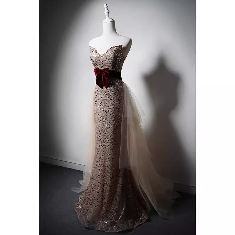 Elegant Champagne Sequined Sheath Gown with Velvet Red Waistband and Tulle Overlay - WonderlandByLilian