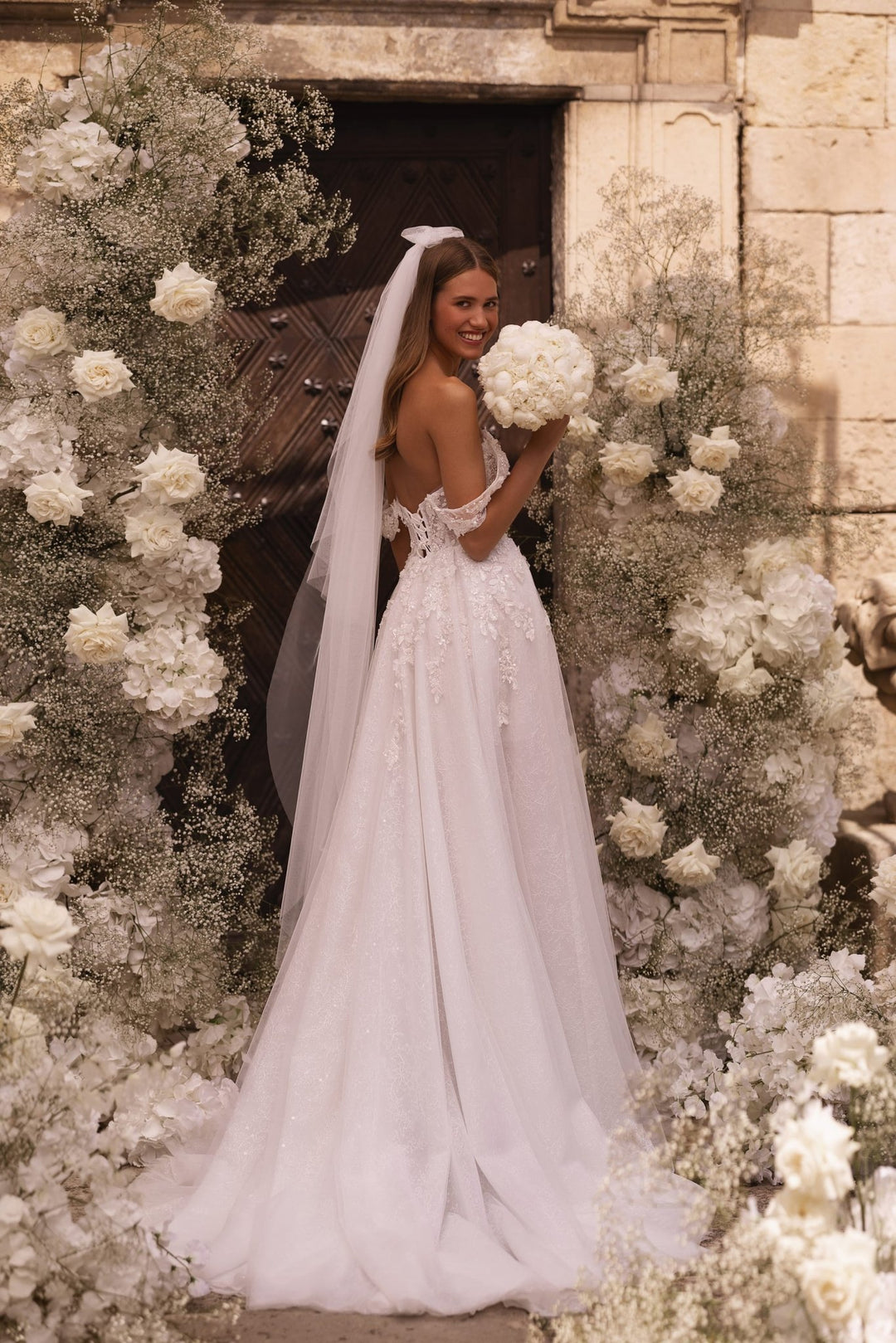 Elegant Ivory Wedding Gown with Floral Embroidery and Beaded Accents Featuring Graceful Leg Slit - Plus Size - WonderlandByLilian