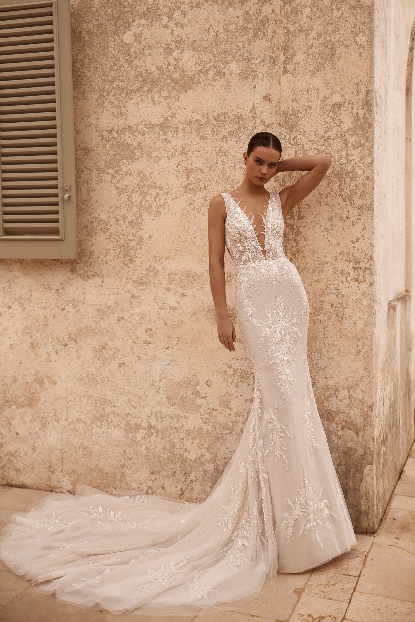 Elegant Lace Mermaid Wedding Gown with Deep V-Neck and Luxurious Train Plus Size - WonderlandByLilian