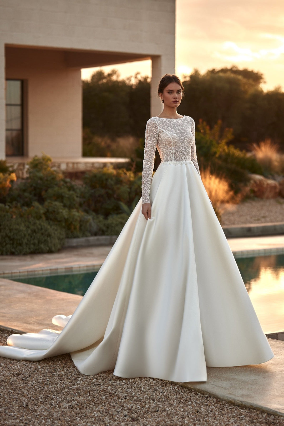 Elegant Modern Long Sleeve Wedding Gown with Lace Details and Beaded Corset Plus Size Available