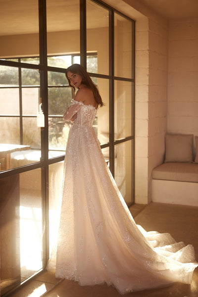 Enchanting Corseted A-Line Bridal Gown with Translucent Sleeves and Embellished Skirt Plus Size - WonderlandByLilian