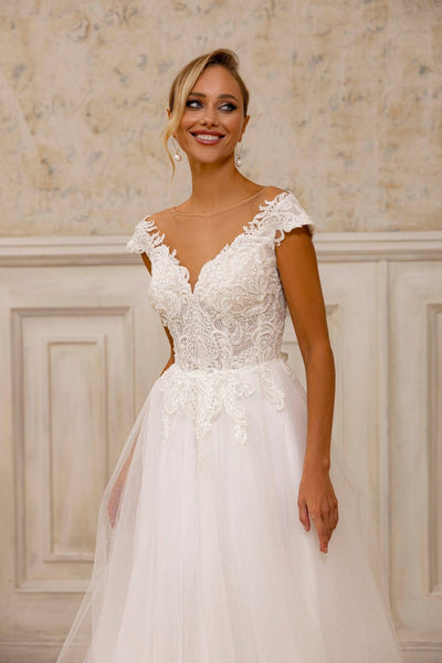 Enchanting Off-Shoulder Tulle Wedding Dress | Romantic Lace Bridal Gown with Train - WonderlandByLilian