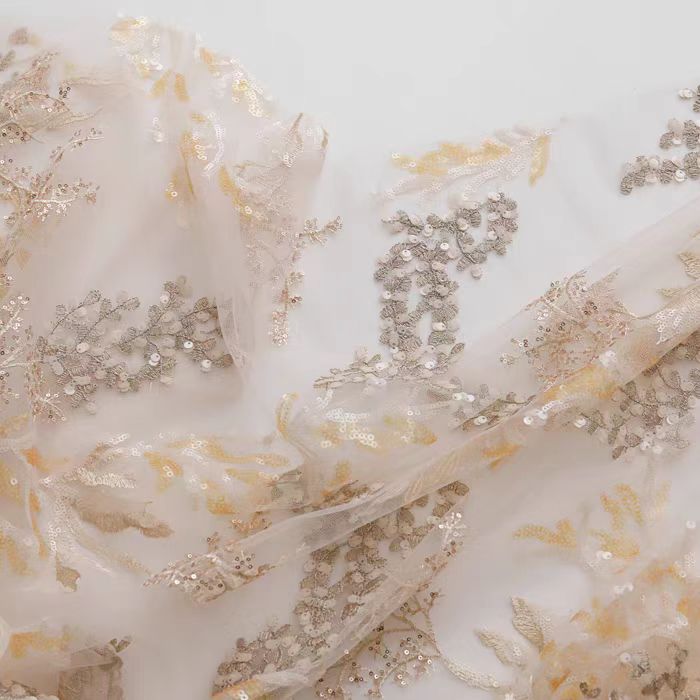 Intricate Full - Width Sequin and Bead Embroidered Tulle Fabric in Soft Cream - WonderlandByLilian