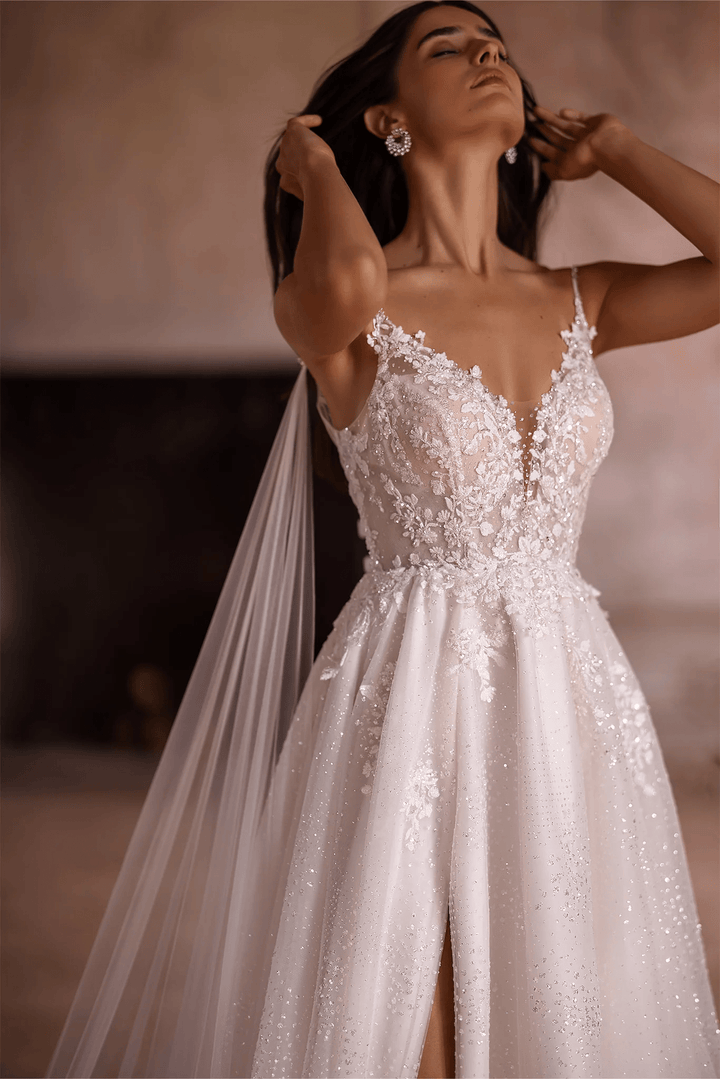 Ivory A - Line Spaghetti Strap Wedding Dress with V - Neck – Sleeveless Lace Wedding Dress with Thigh Slit and Flowing Sheer Train Plus Size - WonderlandByLilian