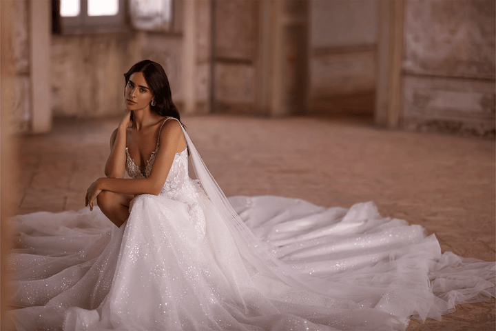Ivory A - Line Spaghetti Strap Wedding Dress with V - Neck – Sleeveless Lace Wedding Dress with Thigh Slit and Flowing Sheer Train Plus Size - WonderlandByLilian
