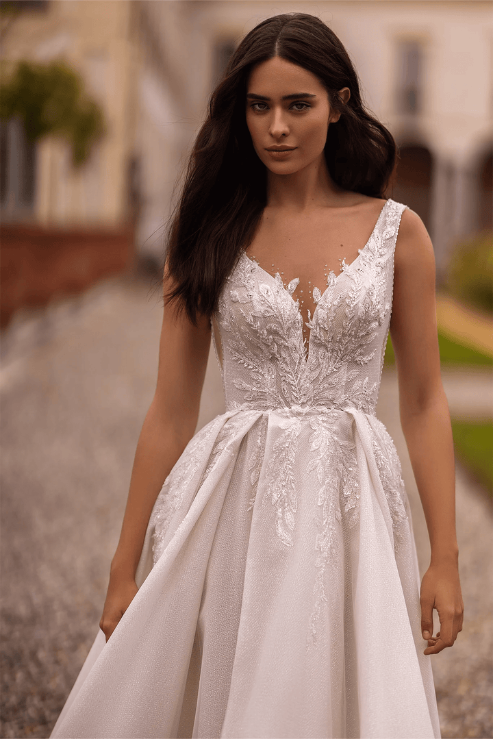 Ivory Lace A - Line Wedding Dress with Sleeveless V - Neck Bodice and Sparkling Train – Embellished Gown with Sheer Skirt and High Slit Plus Size - WonderlandByLilian