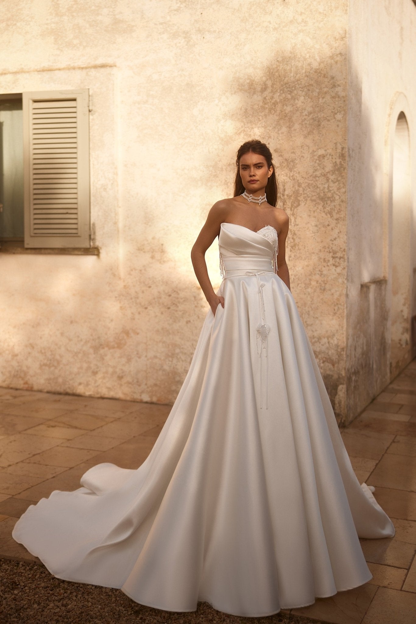 Luxury Satin Strapless Wedding Gown with Beaded Corset and Majestic Tr