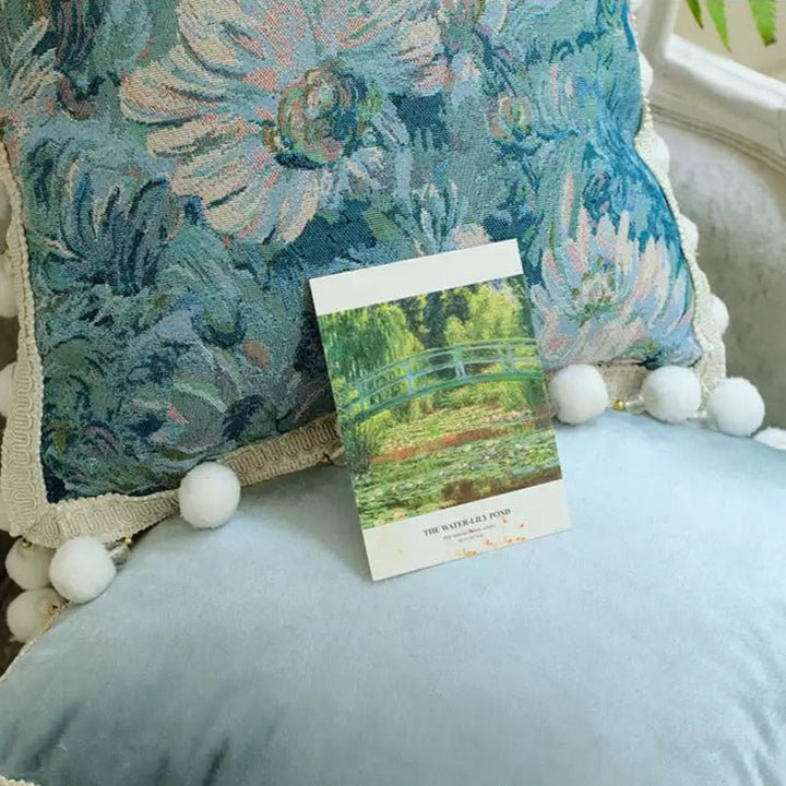 Monet’s Afternoon – Handmade Blue Velvet Cushion with Floral Tapestry and Pom Trim - WonderlandByLilian
