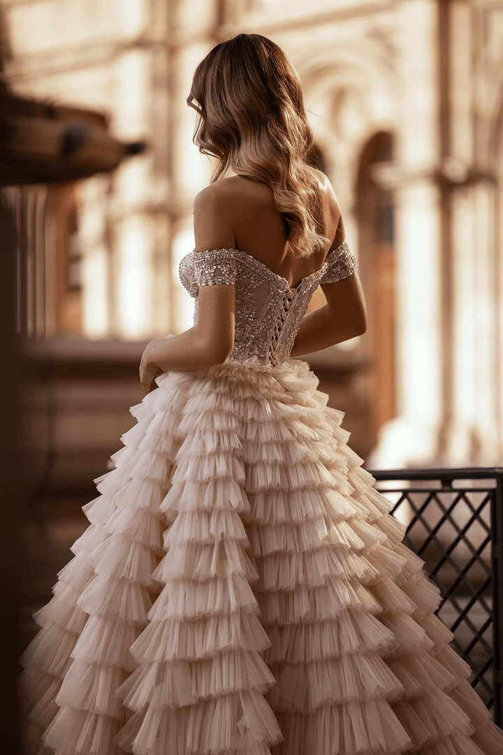 Off Shoulder Wedding Dress with Ruffled Tiered Skirt – Layered Tulle Ruffle Dress with Pearl Trim and Crisscross Back Plus Size - WonderlandByLilian