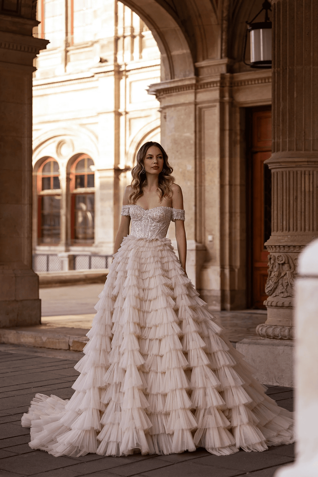 Off Shoulder Wedding Dress with Ruffled Tiered Skirt – Layered Tulle Ruffle Dress with Pearl Trim and Crisscross Back Plus Size - WonderlandByLilian