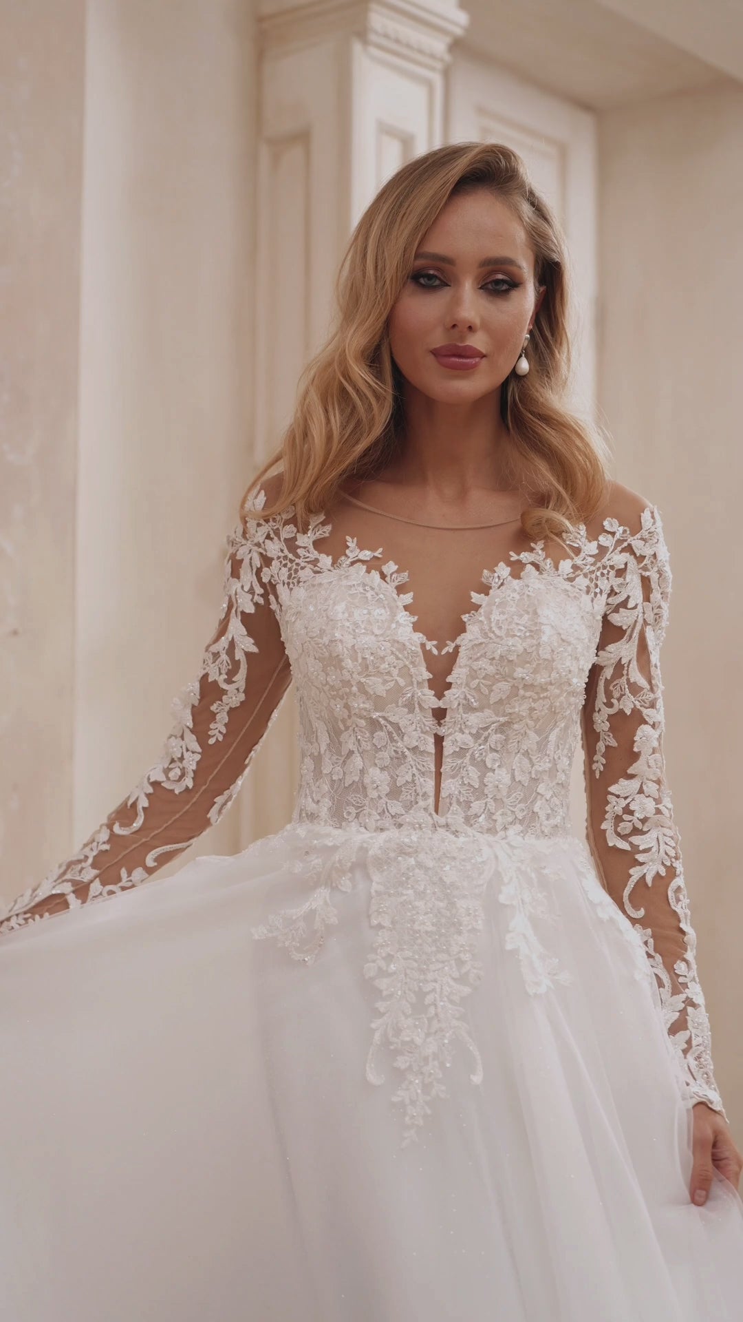 Elegant A-Line Bridal Gown with Lace Detail and Plunging Neckline Plus Size