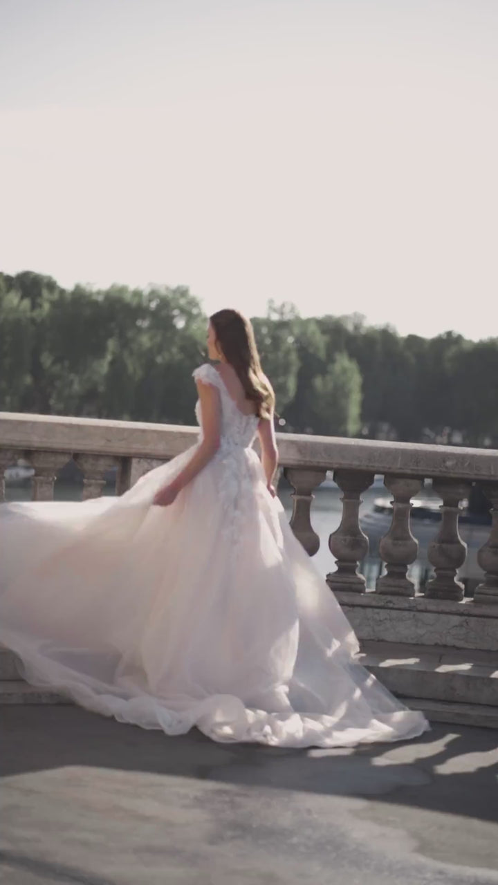 Nude Wedding Dress with Long Sheer Sleeves, 3D Floral Appliqués, and Voluminous Glitter Tulle Skirt Plus Size