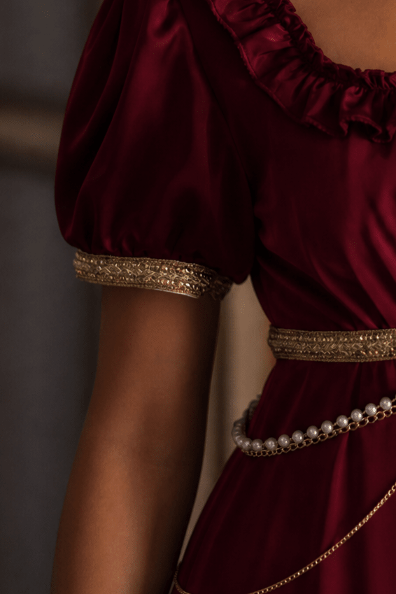 Regency Era Burgundy Satin Empire Waist Gown with Ruffle Trim and Pearl Chain Detail – Bridgerton Inspired Dress Plus Size - WonderlandByLilian