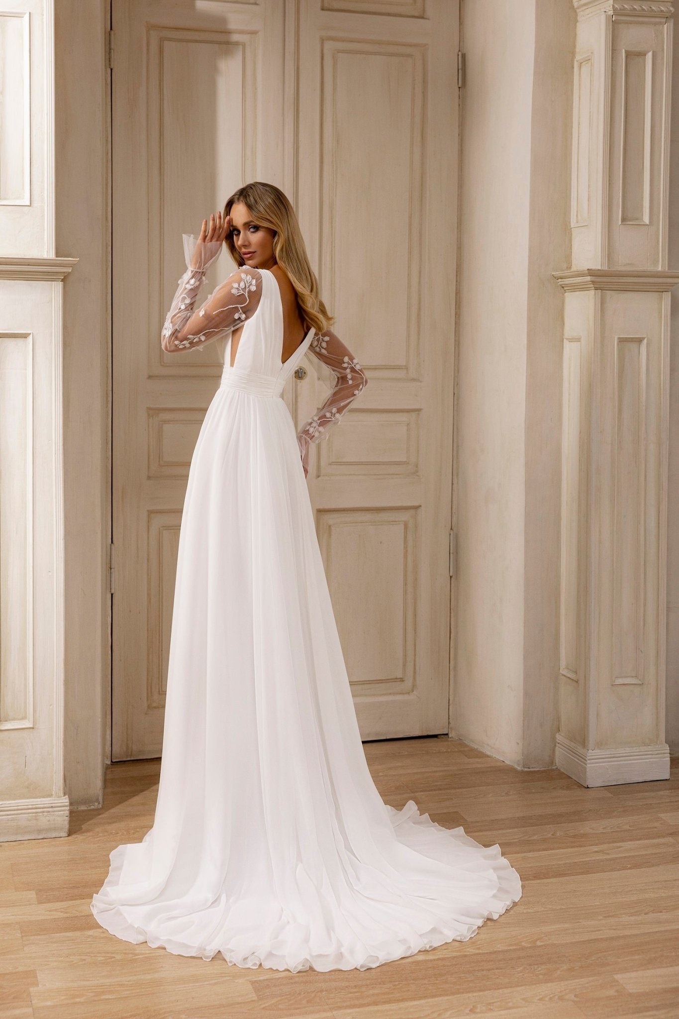 Sheer-Sleeved Deep V-Neck Wedding Dress with Floral Accents and Graceful Train - WonderlandByLilian