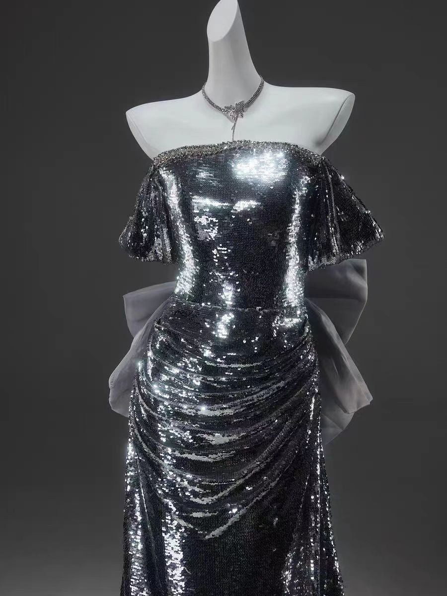 Silver Sequin Off-the-Shoulder Evening Gown with Elegant Draping Silver Sequin Off-the-Shoulder Evening Gown with Elegant Draping
