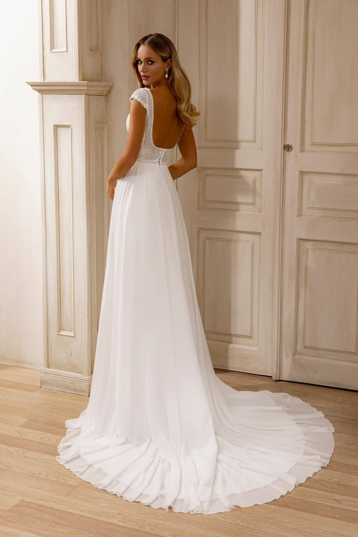 Sophisticated A-Line Wedding Dress with Lace Embellishments and Sheer Overlay Train - WonderlandByLilian