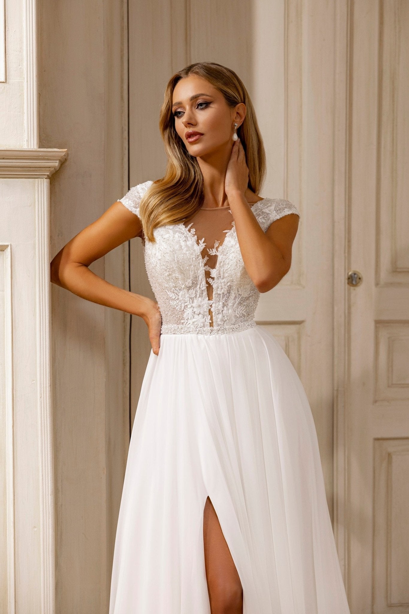 Sophisticated A-Line Wedding Dress with Lace Embellishments and Sheer Overlay Train - WonderlandByLilian